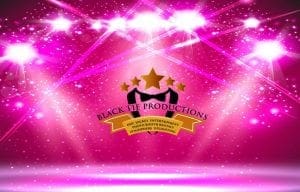 In the heart of an electrified universe, bold pink stage lights burst forth like a cosmic supernova, casting their starry glow on the legendary emblem of Black Tie Productions. Adorned with golden stars and a sharp bowtie, this iconic symbol is the beacon for Michigans mightiest wedding DJs. Powering through events with the strength of celestial forces, they specialize in disc jockey entertainment and photo booth rentals. Harness their instant price-quoter—a powerful tool for organizing your extraordinary event with speed and precision!. :The Event Heroes at Black Tie Productions