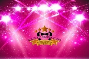 Amidst a radiant pink backdrop ablaze with gleaming light beams and magical sparkles, the legendary emblem of Black Tie Productions emerges triumphantly—a bow tie flanked by shimmering stars. These Event Heroes reign supreme, wielding their prowess in event lighting like an unstoppable force for good. Revered as Michigan’s mightiest wedding DJs, they bring joy and harmony wherever they go!. :The Event Heroes at Black Tie Productions