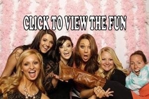 In a dazzling display of girl power and jubilant energy, six heroines strike dynamic poses against a backdrop of vibrant pink feathers. One of them triumphantly brandishes a boot, symbolizing their playful conquest over the ordinary. This scene beckons you with an invitation to CLICK TO VIEW THE FUN. Capture epic memories with the addition of photo booth rentals or event lighting at your celebration for an unforgettable experience that will shine brighter than any supernova!. :The Event Heroes at Black Tie Productions