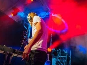 Amidst a swirling sea of vibrant event lights and enchanting smoke effects, stands the sonic superhero, DJ Sonic Boom. Clad in his signature headphones and positioned behind his mighty mixing console, he orchestrates an electrifying symphony that transforms the ordinary into the extraordinary. Each pulse of sound is a thunderous heartbeat that ripples through Black Tie Productions immersive realm, leaving an indelible impression on all who dare to dance in its wake. :The Event Heroes at Black Tie Productions