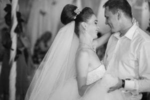 Amidst a celestial aura of shimmering lights, the bride and groom take to the dance floor like superheroes uniting their powers for an epic celebration. The bride, with elegance akin to a goddess commanding her veil, twirls gracefully beside her hero groom. Together, they create a vision so enchanting it seems otherworldly. To amplify this legendary moment into an unforgettable saga, summon the talents of a Michigan wedding DJ—a maestro capable of orchestrating music that will transform your celebration into an epic tale remembered through the ages!. :The Event Heroes at Black Tie Productions