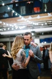 In a realm aglow with the soft shimmer of string lights, a dynamic duo twirls gracefully under the spell of warmth and enchantment. Their synchronized movements illuminate the room, crafting a legendary scene for their fellow revelers. The event lighting, wielded with expert precision like an artist’s paintbrush, transforms this gathering into an extraordinary haven of memories etched in radiant starlight. :The Event Heroes at Black Tie Productions