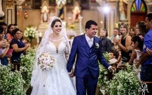 Embracing their destiny with unwavering courage, the noble Bride and valiant Groom stride down the aisle, hand in hand. Their path is aglow with radiant lights that cast a magical brilliance throughout the grand hall, accentuating the splendor of their love. Around them, a legion of champions—family and friends—applaud thunderously, honoring this heroic union on this most extraordinary day. :The Event Heroes at Black Tie Productions