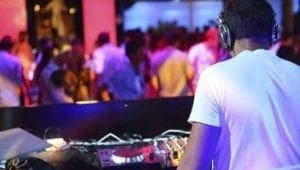 In the dazzling realm of pulsing lights and electrifying energy, Event Hero DJ, a master of rhythmic charisma, stands at the helm. Clad in sleek armor of sound and crowned with headphones like a sentinels helm, they command the stage. Their hands dance across the mixer with precision akin to superhuman agility, orchestrating a symphony that holds every soul captive. The crowd sways to their power-charged beats, caught in an unforgettable sonic adventure crafted by this hero of spectacle and sound waves. :The Event Heroes at Black Tie Productions