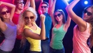 Amidst the thrilling cityscape, a dynamic gathering unfolds as vibrant beings don their glamorous sunglasses and dazzling tops, transforming the dance floor into a realm of electrifying excitement. The atmosphere pulsates with energy under the radiant glow cast by Black Tie Productions elite event lighting, turning an ordinary night into an extraordinary spectacle. Here, under this mesmerizing canopy of light and sound, ordinary citizens embrace their inner heroes on this dance-filled adventure!. :The Event Heroes at Black Tie Productions