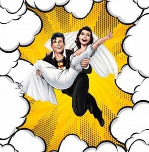 In the vibrant panels of a comic book universe, behold our dashing superhero groom, clad in his formidable superhero suit! With unyielding strength and grace, he lifts his radiant bride effortlessly into the air. Her smile illuminates the sky as they soar against a dynamic yellow backdrop dotted with whimsical white clouds. Capture this epic moment of love and heroism forever with Black Tie Productions – your ultimate sidekick for unforgettable celebrations!. :The Event Heroes at Black Tie Productions