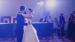 In the shadowy ambiance of a dimly lit ballroom, two figures dressed in splendid formal attire glide across the floor with elegance and grace. They are guided by the unparalleled artistry of Black Tie Productions, whose divine powers orchestrate this mesmerizing spectacle. Enraptured onlookers linger silently in the background, witnesses to this dance of radiance and refinement performed by these unsung heroes of elegance. :The Event Heroes at Black Tie Productions