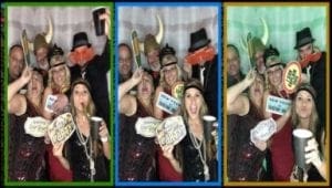 In the heart of celebration, a dynamic league of revelers strikes a pose within the confines of an enchanted photo booth. Equipped with mighty artifacts—hats that conceal identities, signs that tell stories, and goblets worthy of legends—their formation creates a striking triptych tableau. This is no ordinary affair; it’s orchestrated by Event Heroes, the true champions of any epic Michigan wedding. With their super-savoir-faire in event lighting, they transform every photographic moment into an unforgettable adventure, ensuring each snapshot beams with brilliance and magic!. :The Event Heroes at Black Tie Productions