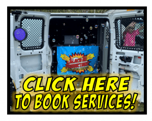 Behold the mighty white van, its doors flung open to reveal a gleaming blue banner of ultimate event services! With a bold call-to-action emblazoned across the screen — Activate here to enlist our extraordinary services! Ideal for all heroes of celebration seeking legendary photo booth rentals or the unrivaled prowess of Michigans wedding DJ virtuosos. Prepare for an unforgettable adventure in festivities!. :The Event Heroes at Black Tie Productions