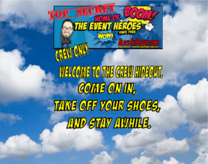 In a dynamic scene with clouds swirling in the backdrop, a bold cartoon sign exclaims: Welcome to the Crew Hideout! Step inside, shed your civilian wear, and bask in the extraordinary! A striking banner heralds: Top Secret: Lair of the Legendary Event Heroes. Access granted to Crew Members only. Fueled by the unstoppable Black Tie Productions for an experience like none other. :The Event Heroes at Black Tie Productions