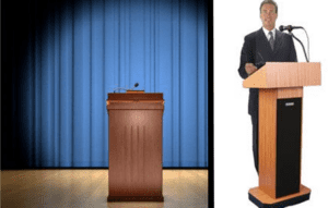 In the grand arena of celebration, a mighty wooden podium stands on the left, flanked by a majestic blue curtain backdrop that whispers secrets of countless legendary vows. To the right, poised with electrifying charisma at an identical podium, stands the Michigan DJ—The Maestro of Matrimony. Armed with his trusty microphone, he is ready to unleash an avalanche of melodies and electrify the atmosphere with tunes that set hearts soaring and feet moving. With powers fueled by rhythm and harmony, hes here to transform this wedding into an unforgettable symphony!. :The Event Heroes at Black Tie Productions